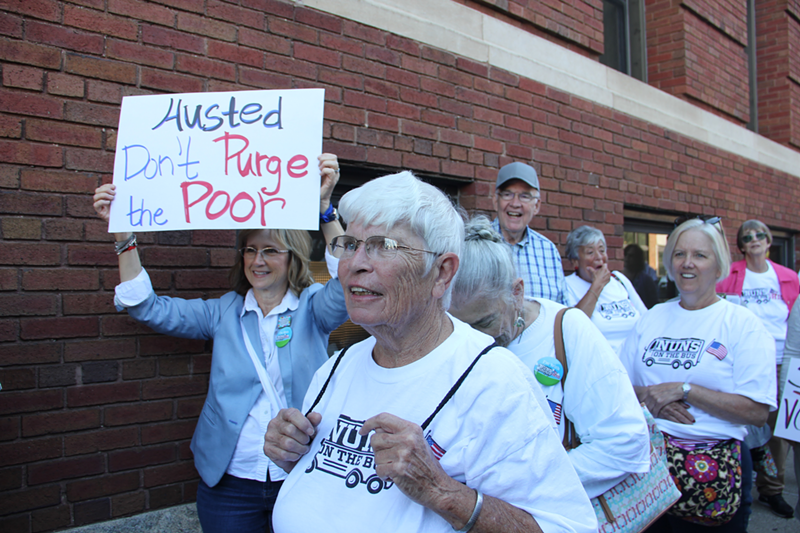 Cincinnati Nuns on the Bus gather outside the Hamilton County Board of Elections Sept. 13 to protest Ohio's voter purges - Nick Swartsell