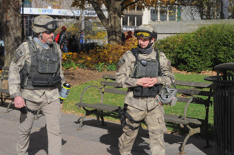 Two members of the self-identified “Ohio State Regular Militia” attend clashing political events at the Capitol on Nov. 7. - Photo: Jake Zuckerman