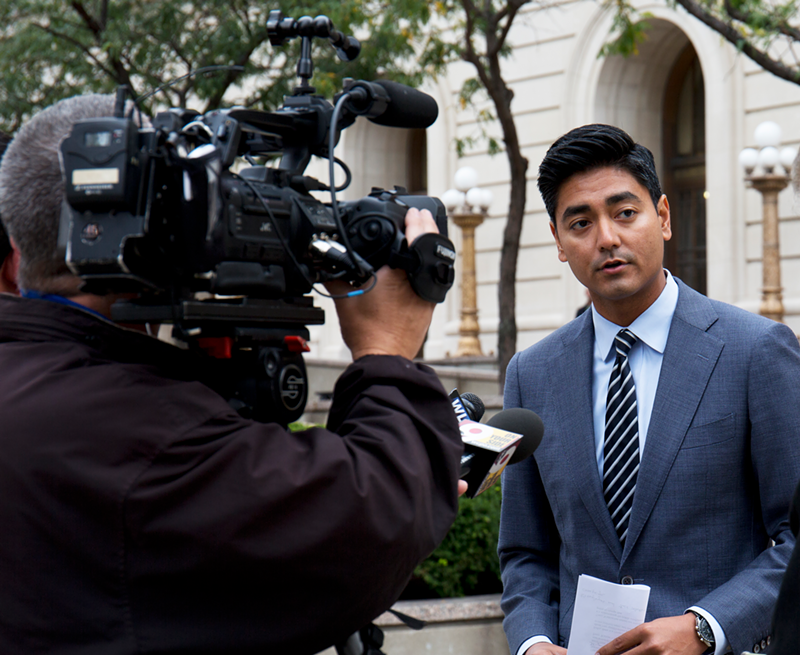 Aftab Pureval, Democratic candidate for Hamilton County clerk of courts, speaks to reporters outside the courthouse Oct. 11.