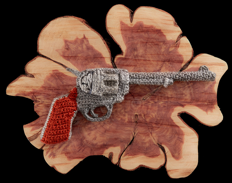Crocheted “Peacemaker” in A Loaded Conversation - PHOTO: Rob Wolpert
