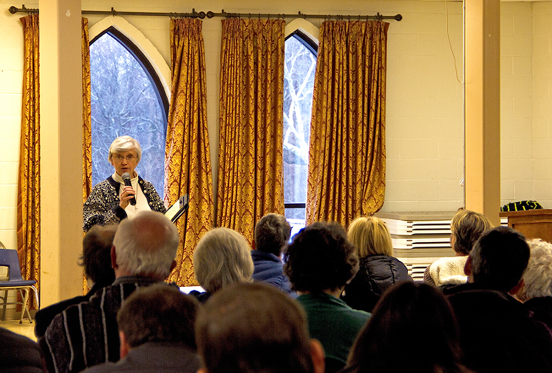 Sister Alice Gerdeman, a key member of Cincinnati’s 1980s-era sanctuary movement, speaks to a crowd of about 150 faith leaders at Clifton Mosque. - Photo: Nick Swartsell