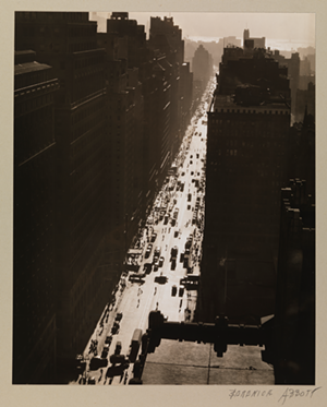"Seventh Avenue Looking South from 35th Street," 1935. Gelatin silver print, 9¼ x 7½ inches. - Photo: Berenice Abbott // Courtesy of Museum of the City of New York. Gift of the Metropolitan Museum of Art, 1949