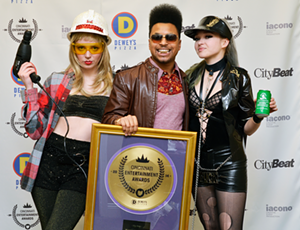 Buggs Tha Rocka (aka SPEED Walton) and some lovely CEA trophy presenters at the 2014 event, following Buggs/Speed's latest win for top Hip Hop artist - PHOTO: JESSE FOX/CITYBEAT ARCHIVE