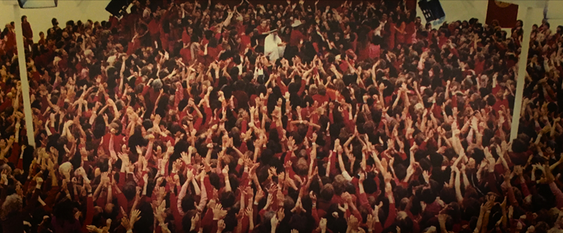White robe-wearing Bhagwan surrounded by his cult’s followers - PHOTO: Courtesy of Netflix
