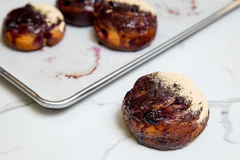 Blueberry sticky buns dusted with kinako, a roasted soybean flour that’s similar in taste and texture to peanut butter powder. - Photo: Hailey Bollinger