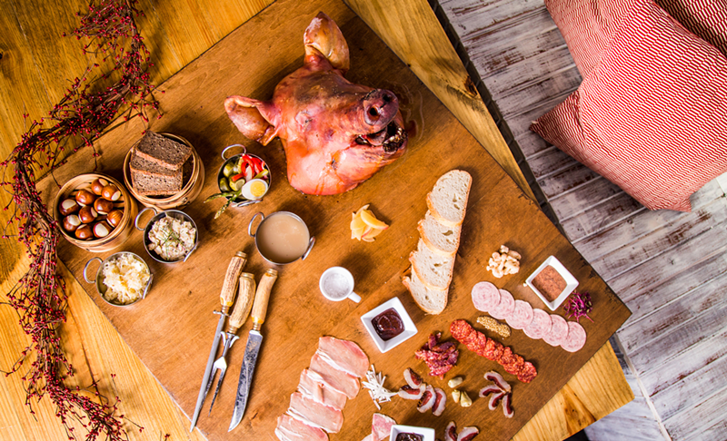 Tete du Cochon served with charcuterie - Photo: Hailey Bollinger
