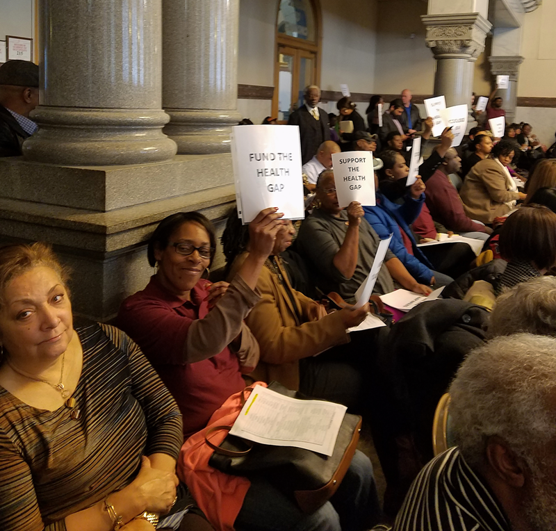 Supporters of the Center for Closing the Health Gap crowd a Cincinnati City Council meeting March 15. - Nick Swartsell