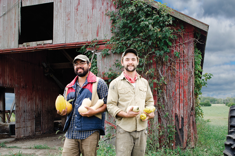 EcOhio’s Ben Nava (left) and Ben Rush, with just-harvested squash.
