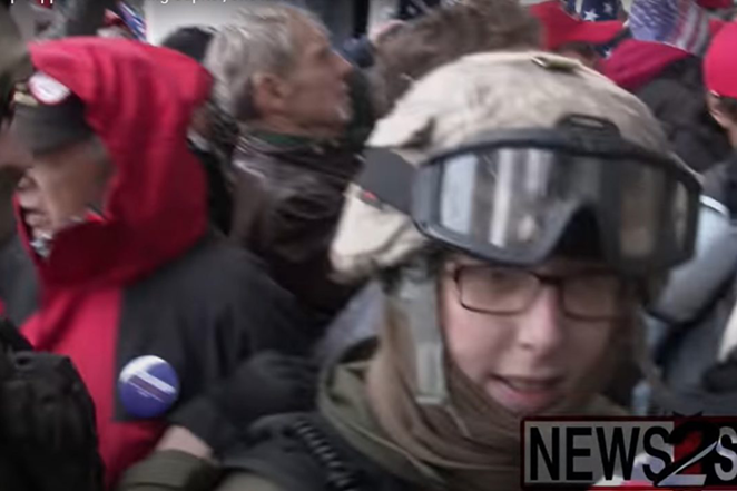 A still from footage of the riots in Washington D.C. captures Jessica Watkins, 38, seen with several people in Oathkeepers regalia, heading up the Capitol stairs. - Photo: Screenshot from YouTube, credit Ford Fischer / News2Share.