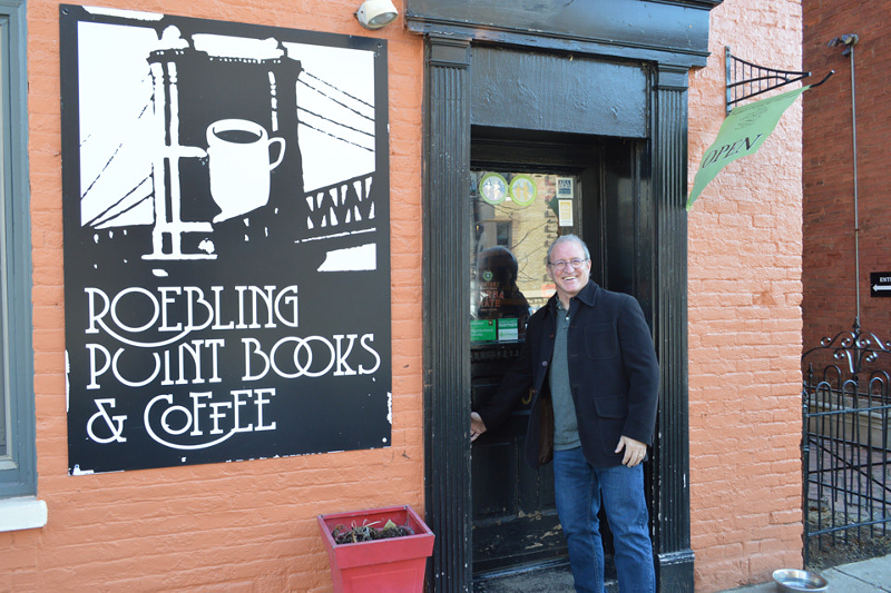 Roebling Point Books & Coffee owner Richard Hunt outside the flagship Covington location - PHOTO: KATIE GRIFFITH