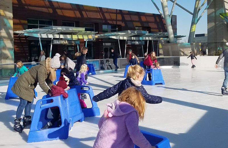 Ice skating aids (those blue things) are available to borrow for free at the Summit Park ice rink - Photo: facebook.com/SummitParkBlueAsh