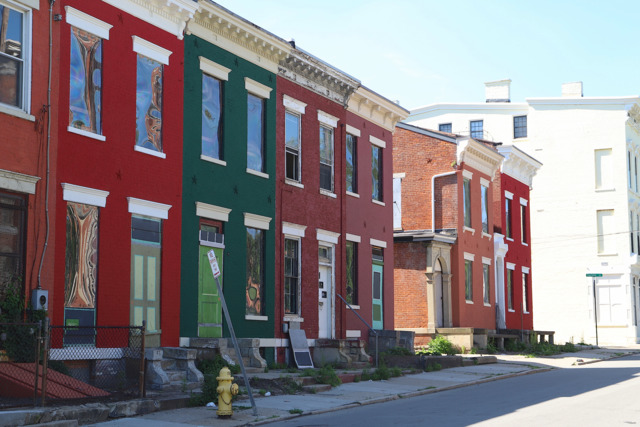 Rowhouses on Baymiller Street in the West End awaiting renovation - PHOTO: NICK SWARTSELL