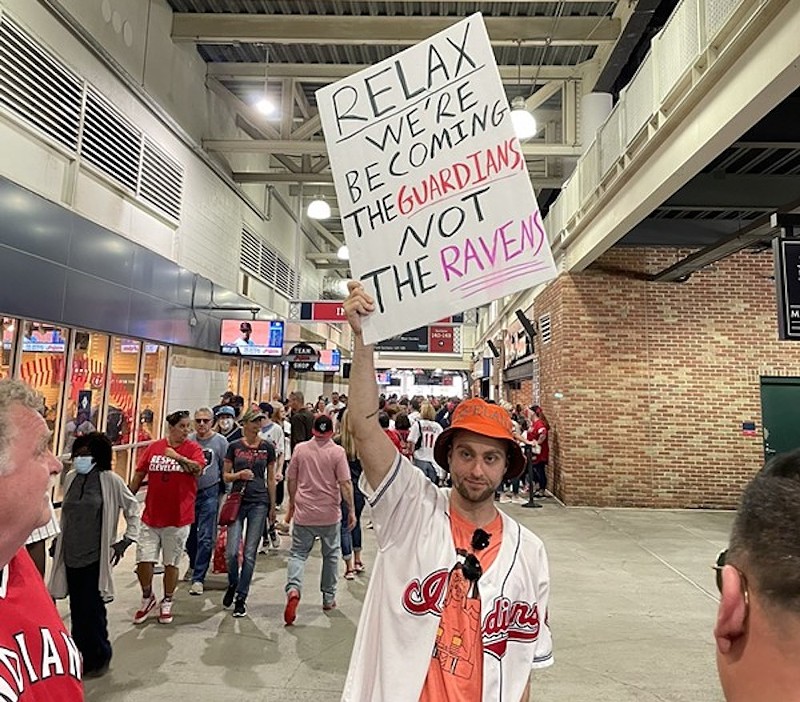 A Cleveland baseball fan holds a sign in 2021 shortly after the team announced its name change. - photo: Vince Grzegorek