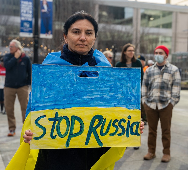 A marcher protests the invasion of Ukraine in Cincinnati on Feb. 28 - Photo: Casey Roberts