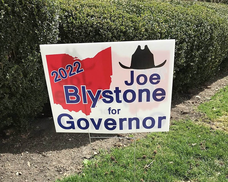 GOP Gubernatorial Candidate Joe Blystone Shares Photo Standing in Front of Swastika