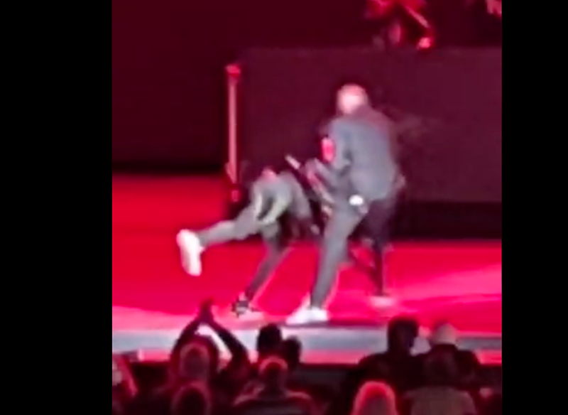 Isaiah Lee rushes Dave Chappelle on stage during Chappelle's May 3 performance at the Netflix Is a Joke festival at the Hollywood Bowl. - Photo: twitter.com/abazar