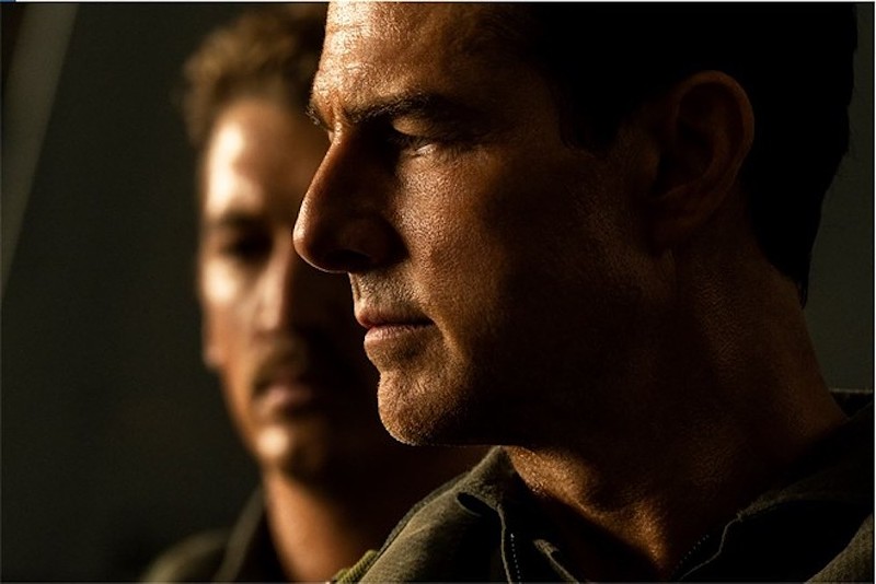 Rooster (Miles Teller) has lived in the shadow of Maverick (Tom Cruise) for his entire life; thankfully, a nuclear threat will force them to not talk about their feelings while they fly to their possible doom. - Photo: Paramount Pictures, Skydance and Jerry Bruckheimer Films