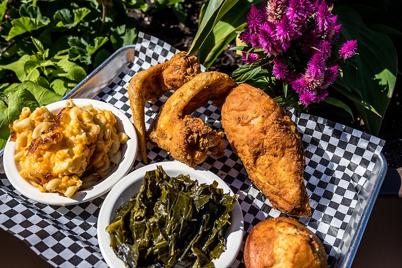 Fried chicken, collard greens and macaroni and cheese are on the menu at Soul Secrets. - Photo: Catie Viox