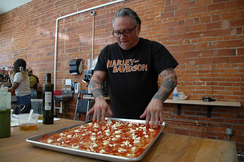 El Camino Baking Co. owner Ryan Morgan experimenting with a Sicilian pizza recipe - Photo: Sean M. Peters