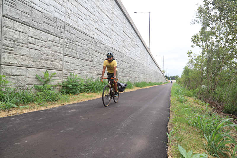 Cyclist Tanner Yess rides on the current Lower Price Hill bike path. - Photo: Nick Swartsell