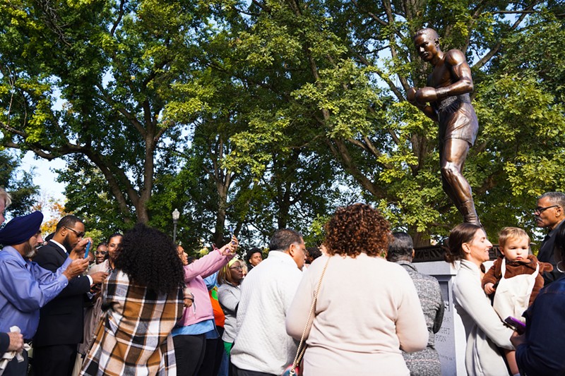 A crowd gathers around the newly unveiled Ezzard Charles statue in Ezzard Charles Park in Cincinnati's West End on Oct. 1, 2022. - Photo: Provided by Cincinnati Parks