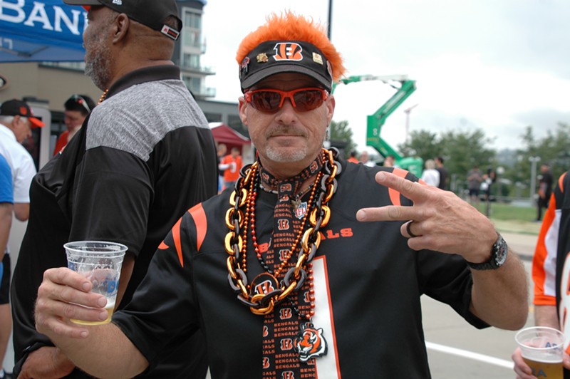 A Cincinnati Bengals fan celebrates during a tailgate before the season opener on Sept. 11, 2022. - Photo: Sean M. Peters