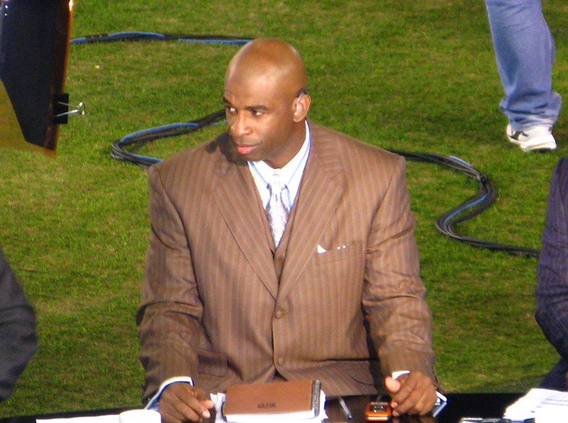 Former NFL and MLB star Deion Sanders leads analysis on a sports broadcast in 2008. - Photo: Michael De Jesus, Wikimedia Commons