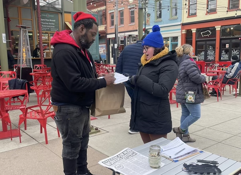 Supporters of the Amazon Air Hub union effort are collecting signatures from the public in support of their demand for higher wages. - Photo: Via Griffin Ritze