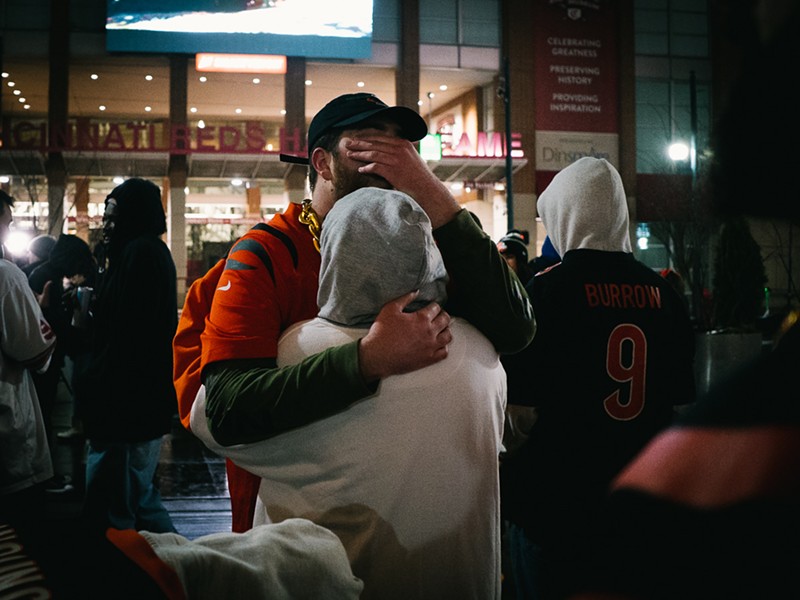 Cincinnati Bengals fans at The Banks in Cincinnati console each other after losing the AFC championship to the Kansas City Chiefs on Jan. 29, 2023. - Photo: Aidan Mahoney