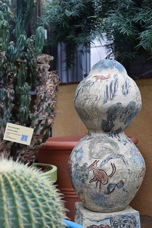 "Animal Globe" by Roy Cartwright at Krohn Conservatory's Ceramics in a Garden exhibit. - Photo: Mackenzie Manley
