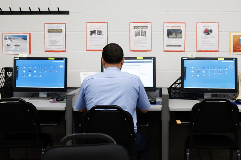 MANSFIELD, Ohio — AUGUST 23: An incarcerated person works on a computer in the Hope Valley School, part of the Ohio Central School System housed at the Richland Correctional Institution, August 23, 2023, at the Richland Correctional Institution in Mansfield, Ohio. - Photo by: Graham Stokes for Ohio Capital Journal