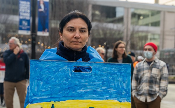 A marcher protests the invasion of Ukraine in Cincinnati on Feb. 28