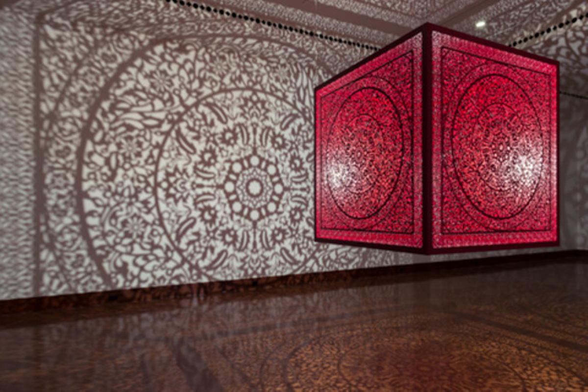 Anila Quayyum Agha (b. 1965), All the Flowers Are for Me (Red), laser-cut lacquered steel and lightbulb, 60x60x60 in, Alice Bimel Endowment for Asian Art, 2017.7