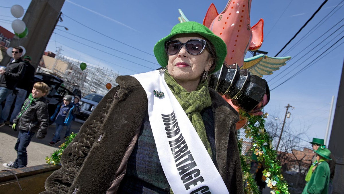 Maureen Kennedy of the Irish Heritage Center sits with her float in the staging area before the Cincinnati St. Patrick's Parade.