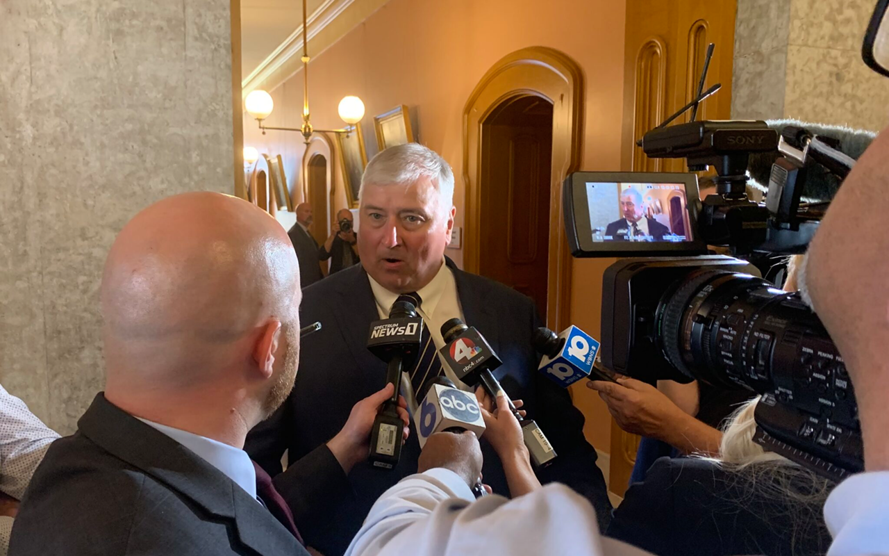 Larry Householder addresses reporters June 16 after lawmakers voted to expel him from the General Assembly.
