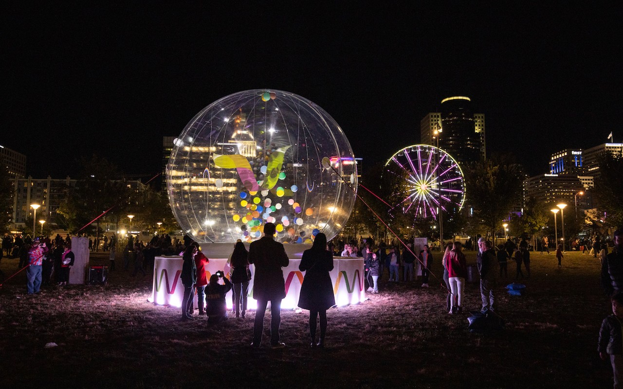A kick-off parade, projection mapping, interactive light sculptures, animated murals, and live music are expected to be part of BLINK 2022, as they were in BLINK 2019, shown here.