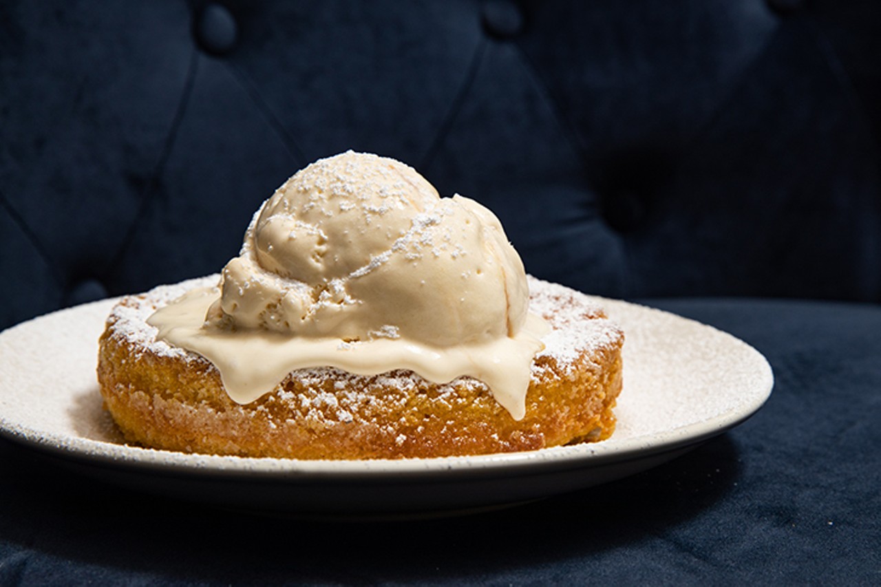 The butter cake, which arrives warm in a skillet topped with salted caramel ice cream.