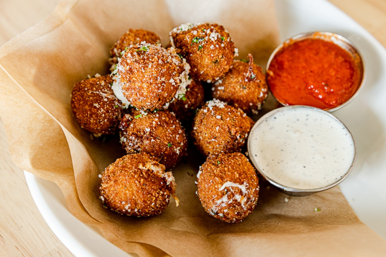 Fresh fried mozzarella balls with parmesan and roasted tomato dipping sauces ($12)