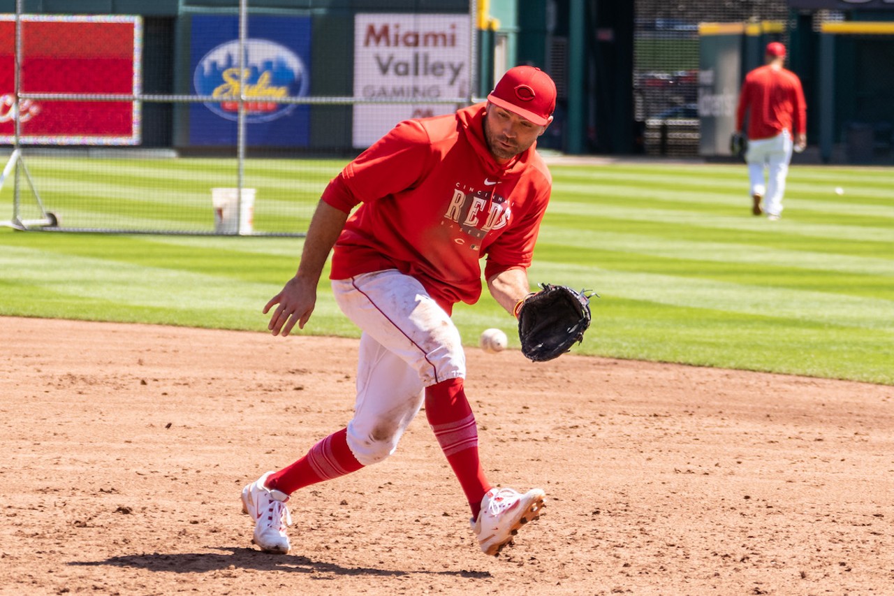 Cincinnati Reds first baseman Joey Votto takes fielding practice before the season opener at Great American Ball Park on March 30, 2023.