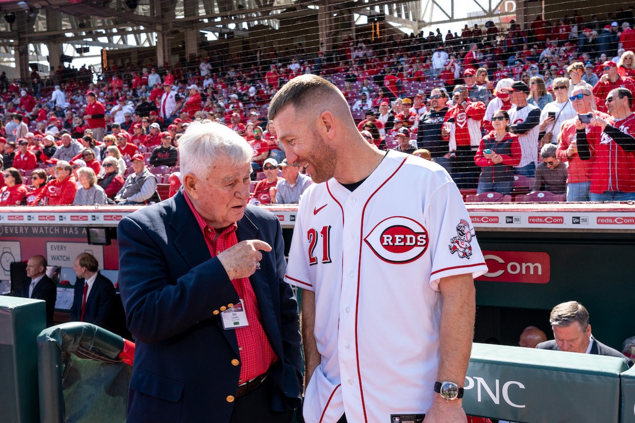 Cincinnati Reds team owner Bob Castellini (left) chats with former infielder Todd Frazier before the season opener at Great American Ball Park on March 30, 2023.