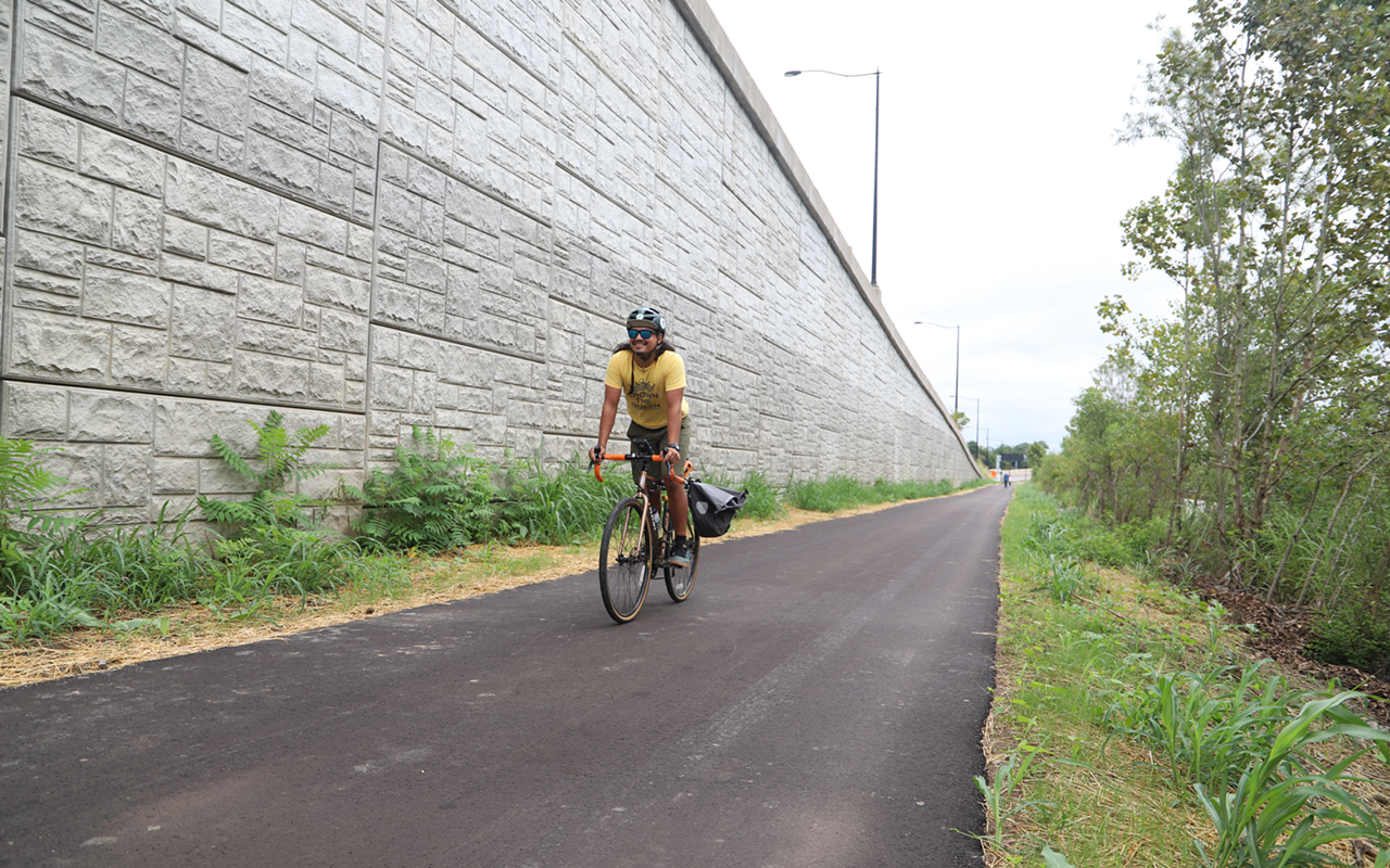 Cyclist Tanner Yess rides on the current Lower Price Hill bike path.
