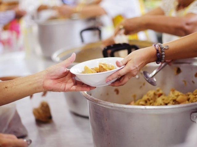 Volunteering at a soup kitchen or homeless shelter is one way to honor Dr. King's legacy of service.