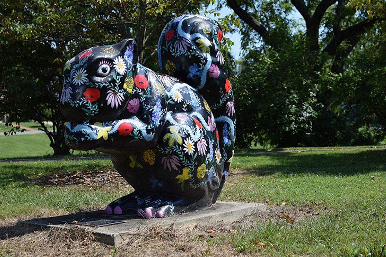 "Flower Power" squirrel sits on Congress Avenue at Carruthers Park.