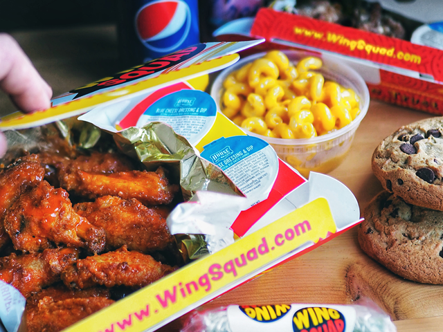 A spread of menu items available from Wing Squad