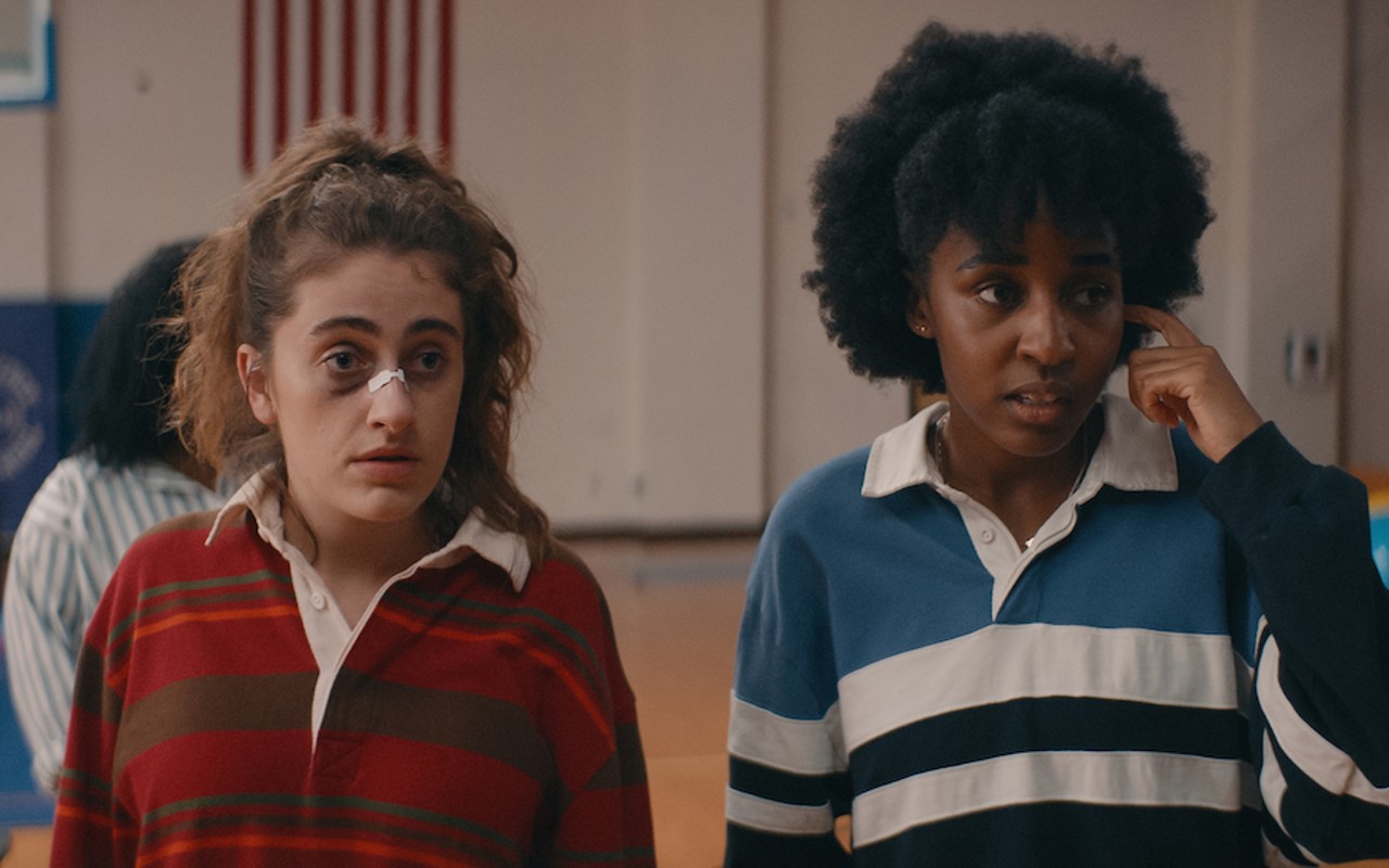 Queer girls Josie (Ayo Edebiri) and PJ (Rachel Sennott), on the far left, cope with the absurdity of high school.